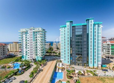 Видовая двухкомнатная квартира, 68м², в элитном комплексе в Махмутларе, Алания, в 200м от моря ID-19061 фото-1