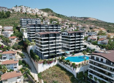 Элегантная видовая двухкомнатная квартира, 64м², в элитном комплексе района Каргыджак, Алания ID-19063 фото-1