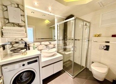 Элегантная видовая двухкомнатная квартира, 64м², в элитном комплексе района Каргыджак, Алания ID-19063 фото-6