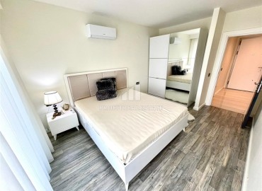 Элегантная видовая двухкомнатная квартира, 64м², в элитном комплексе района Каргыджак, Алания ID-19063 фото-8