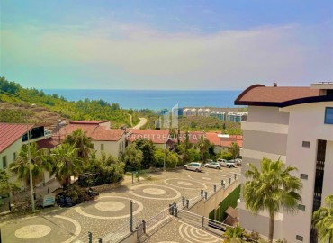 Элегантная видовая двухкомнатная квартира, 64м², в элитном комплексе района Каргыджак, Алания ID-19063 фото-11