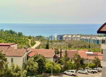 Элегантная видовая двухкомнатная квартира, 64м², в элитном комплексе района Каргыджак, Алания ID-19063 фото-12