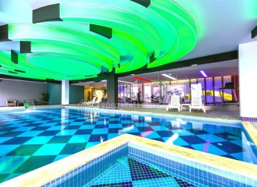 Элегантная видовая двухкомнатная квартира, 64м², в элитном комплексе района Каргыджак, Алания ID-19063 фото-19