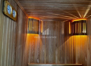 Элегантная видовая двухкомнатная квартира, 64м², в элитном комплексе района Каргыджак, Алания ID-19063 фото-23