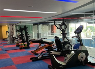 Элегантная видовая двухкомнатная квартира, 64м², в элитном комплексе района Каргыджак, Алания ID-19063 фото-26