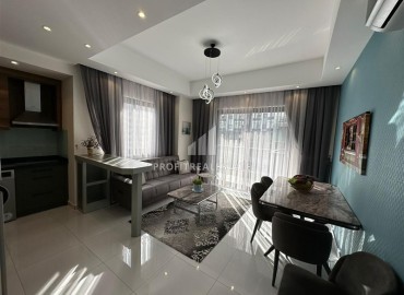 Элегантные трехкомнатные апартаменты, 100м², в элитном комплексе в Махмутларе, Алания ID-19074 фото-2