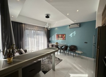 Элегантные трехкомнатные апартаменты, 100м², в элитном комплексе в Махмутларе, Алания ID-19074 фото-3