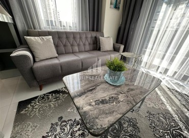 Элегантные трехкомнатные апартаменты, 100м², в элитном комплексе в Махмутларе, Алания ID-19074 фото-5