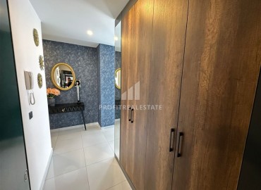 Элегантные трехкомнатные апартаменты, 100м², в элитном комплексе в Махмутларе, Алания ID-19074 фото-8
