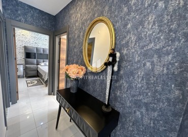 Элегантные трехкомнатные апартаменты, 100м², в элитном комплексе в Махмутларе, Алания ID-19074 фото-10
