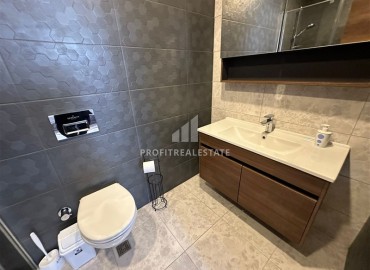 Элегантные трехкомнатные апартаменты, 100м², в элитном комплексе в Махмутларе, Алания ID-19074 фото-18