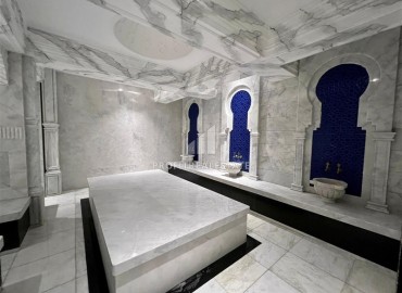 Элегантные трехкомнатные апартаменты, 100м², в элитном комплексе в Махмутларе, Алания ID-19074 фото-24