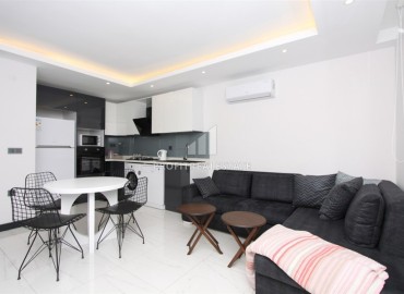 Стильная квартира с одной спальней, 55м², в современном комплексе в центре Алании с отличной локацией ID-19077 фото-2