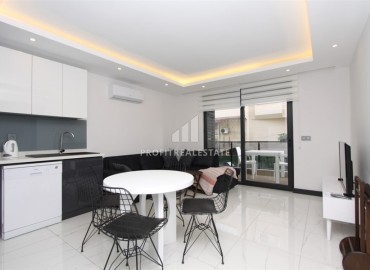 Стильная квартира с одной спальней, 55м², в современном комплексе в центре Алании с отличной локацией ID-19077 фото-3