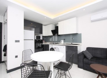 Стильная квартира с одной спальней, 55м², в современном комплексе в центре Алании с отличной локацией ID-19077 фото-6