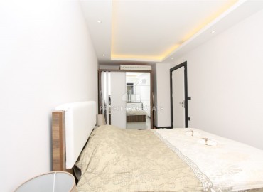 Стильная квартира с одной спальней, 55м², в современном комплексе в центре Алании с отличной локацией ID-19077 фото-9