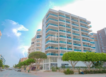 Симпатичная двухкомнатная квартира, 70м², с видом на горы в 200м от моря в Махмутларе, Алания ID-19088 фото-1