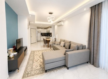 Меблированная квартира с двумя спальнями, 120м², в комплексе премиум класса в 300м от моря в Махмутларе, Алания ID-19090 фото-2