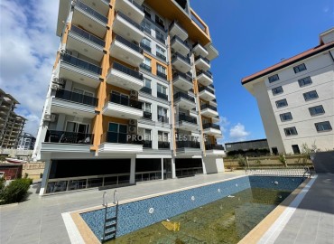Меблированные апартаменты с одной спальней, 47м² в комфортабельной новостройке в Авсалларе, Алания ID-19091 фото-1