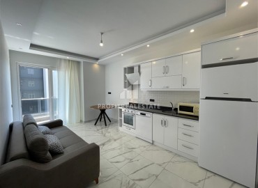 Меблированные апартаменты с одной спальней, 47м² в комфортабельной новостройке в Авсалларе, Алания ID-19091 фото-5