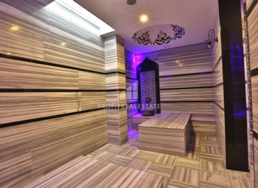 Меблированная двухкомнатная квартира, 75м², в элитном комплексе в Авсалларе, Алания, в 500м от моря ID-19092 фото-16