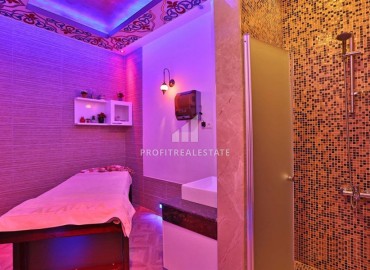 Меблированная двухкомнатная квартира, 75м², в элитном комплексе в Авсалларе, Алания, в 500м от моря ID-19092 фото-17