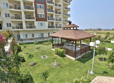 Меблированная двухкомнатная квартира, 75м², в элитном комплексе в Авсалларе, Алания, в 500м от моря ID-19092 фото-20