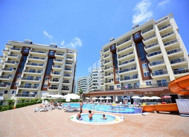Меблированная двухкомнатная квартира, 75м², в элитном комплексе в Авсалларе, Алания, в 500м от моря ID-19092 фото-22