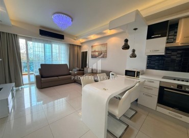 Элегантная двухкомнатная квартира, 68м², с видом на горы в элитном комплексе Махмулара, Алания ID-19094 фото-3