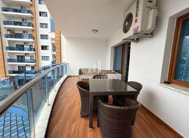 Элегантная двухкомнатная квартира, 68м², с видом на горы в элитном комплексе Махмулара, Алания ID-19094 фото-14