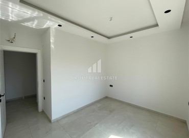 Комфортабельная квартира с одной спальней, 55м², в новостройке премиум класса в центре Махмутлара, Алания ID-19096 фото-5