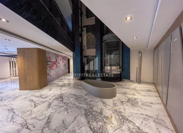 Комфортабельная квартира с одной спальней, 55м², в новостройке премиум класса в центре Махмутлара, Алания ID-19096 фото-18
