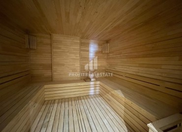 Комфортабельная квартира с одной спальней, 55м², в новостройке премиум класса в центре Махмутлара, Алания ID-19096 фото-22