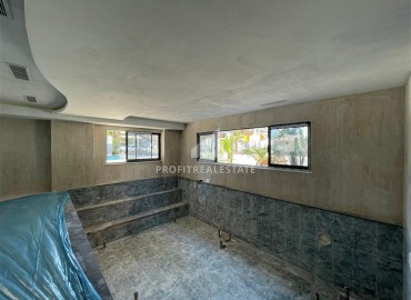 Комфортабельная квартира с одной спальней, 55м², в новостройке премиум класса в центре Махмутлара, Алания ID-19096 фото-24