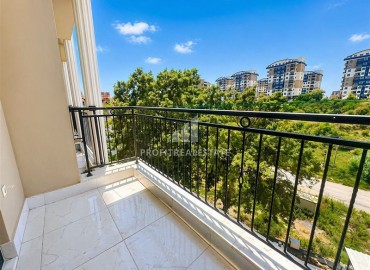 Двухкомнатные стильные апартаменты, 45м², в комплексе с хорошей инфраструктурой в Авсалларе, Алания ID-19097 фото-9