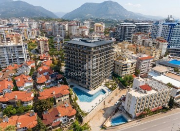 Элитная недвижимость: видовые апартаменты 1+1, 50м², в комплексе премиум-класса в 200м от моря в районе Алании Тосмур ID-18535 фото-1