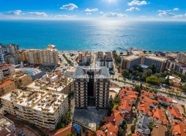Элитная недвижимость: видовые апартаменты 1+1, 50м², в комплексе премиум-класса в 200м от моря в районе Алании Тосмур ID-18535 фото-17