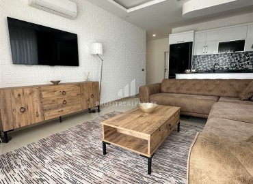 Элегантные апартаменты с одной спальней, 50м², в резиденции с хорошей инфраструктурой у моря в Махмутларе, Алания ID-19099 фото-7