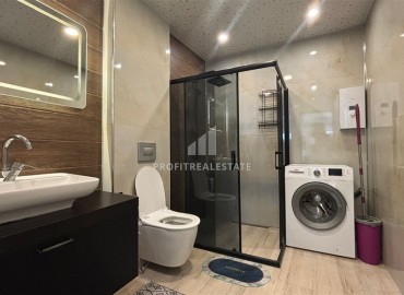 Элегантные апартаменты с одной спальней, 50м², в резиденции с хорошей инфраструктурой у моря в Махмутларе, Алания ID-19099 фото-14
