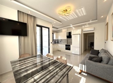 Элегантная двухкомнатная квартира, 72м², в новостройке с бассейном в центре Алании, 500м от пляжа Клеопатры ID-19100 фото-4