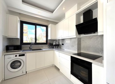 Элегантная двухкомнатная квартира, 72м², в новостройке с бассейном в центре Алании, 500м от пляжа Клеопатры ID-19100 фото-8