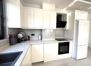 Элегантная двухкомнатная квартира, 72м², в новостройке с бассейном в центре Алании, 500м от пляжа Клеопатры ID-19100 фото-9