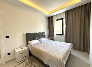 Элегантная двухкомнатная квартира, 72м², в новостройке с бассейном в центре Алании, 500м от пляжа Клеопатры ID-19100 фото-13
