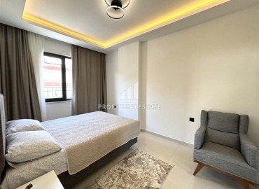 Элегантная двухкомнатная квартира, 72м², в новостройке с бассейном в центре Алании, 500м от пляжа Клеопатры ID-19100 фото-15
