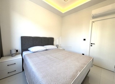 Элегантная двухкомнатная квартира, 72м², в новостройке с бассейном в центре Алании, 500м от пляжа Клеопатры ID-19100 фото-17