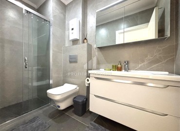 Элегантная двухкомнатная квартира, 72м², в новостройке с бассейном в центре Алании, 500м от пляжа Клеопатры ID-19100 фото-20