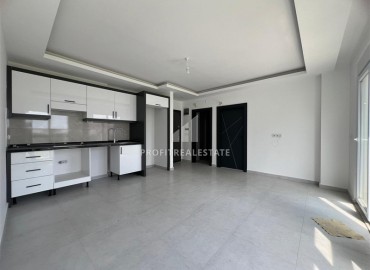 Новая двухкомнатная квартира, 52м², с чистовой отделкой в комплексе с инфраструктурой в Авсалларе, Алания ID-19104 фото-2