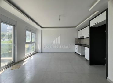 Новая двухкомнатная квартира, 52м², с чистовой отделкой в комплексе с инфраструктурой в Авсалларе, Алания ID-19104 фото-3