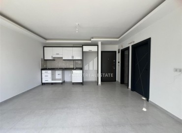 Новая двухкомнатная квартира, 52м², с чистовой отделкой в комплексе с инфраструктурой в Авсалларе, Алания ID-19104 фото-4