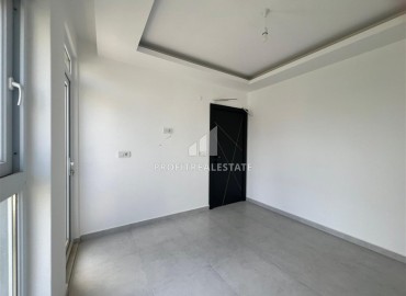 Новая двухкомнатная квартира, 52м², с чистовой отделкой в комплексе с инфраструктурой в Авсалларе, Алания ID-19104 фото-6